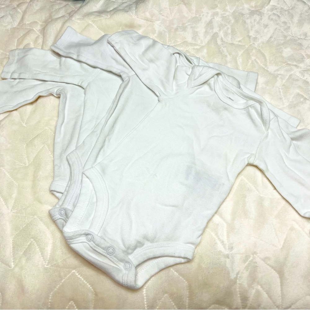 Bundle of white onesies 0-3m